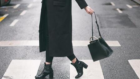 Why should we wear dark clothes in winter?